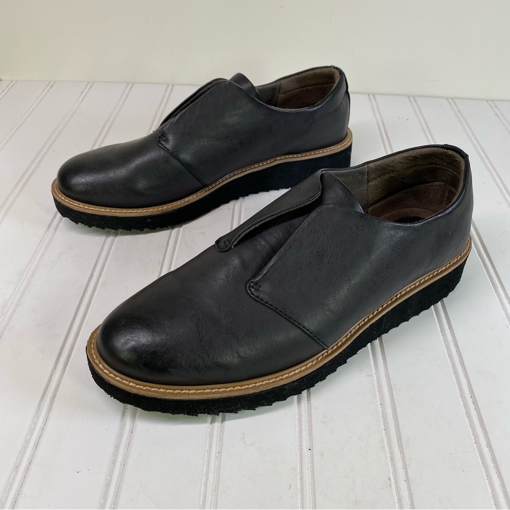 Black leather Oxford type slip ons
